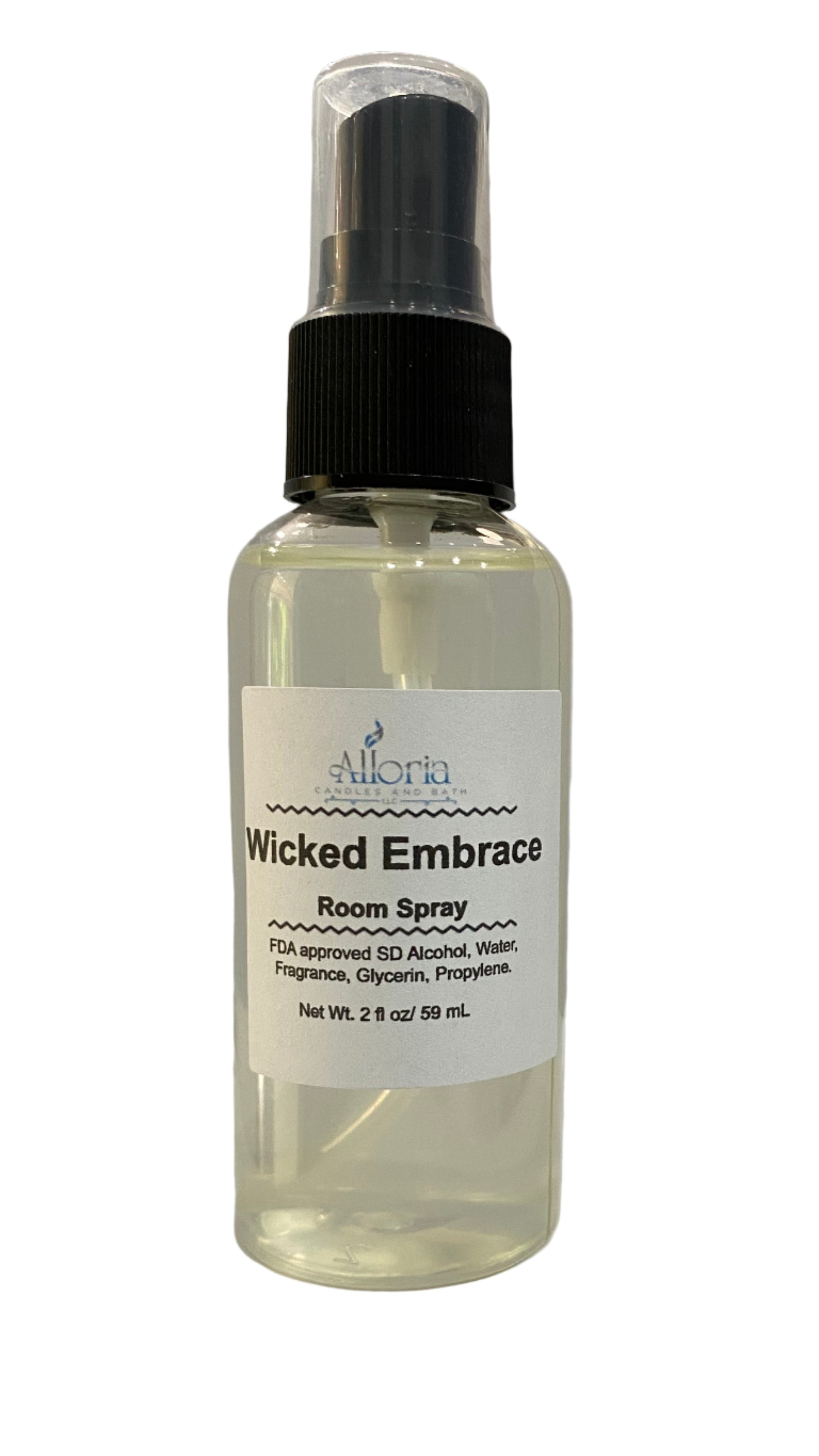 Bottle of room spray labeled 'Wicked Embrace' on a white surface